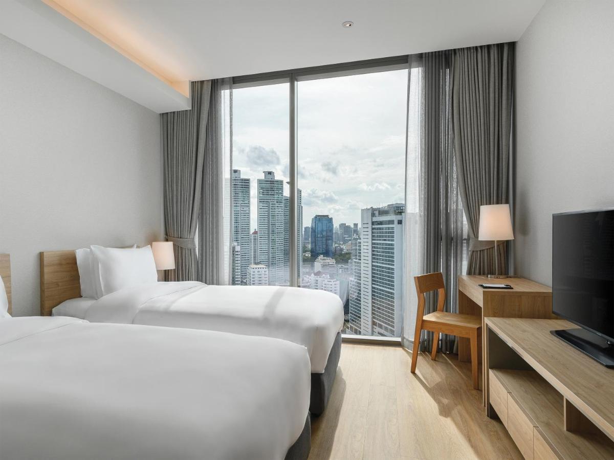 Oakwood Suites Μπανγκόκ Εξωτερικό φωτογραφία Deluxe Room