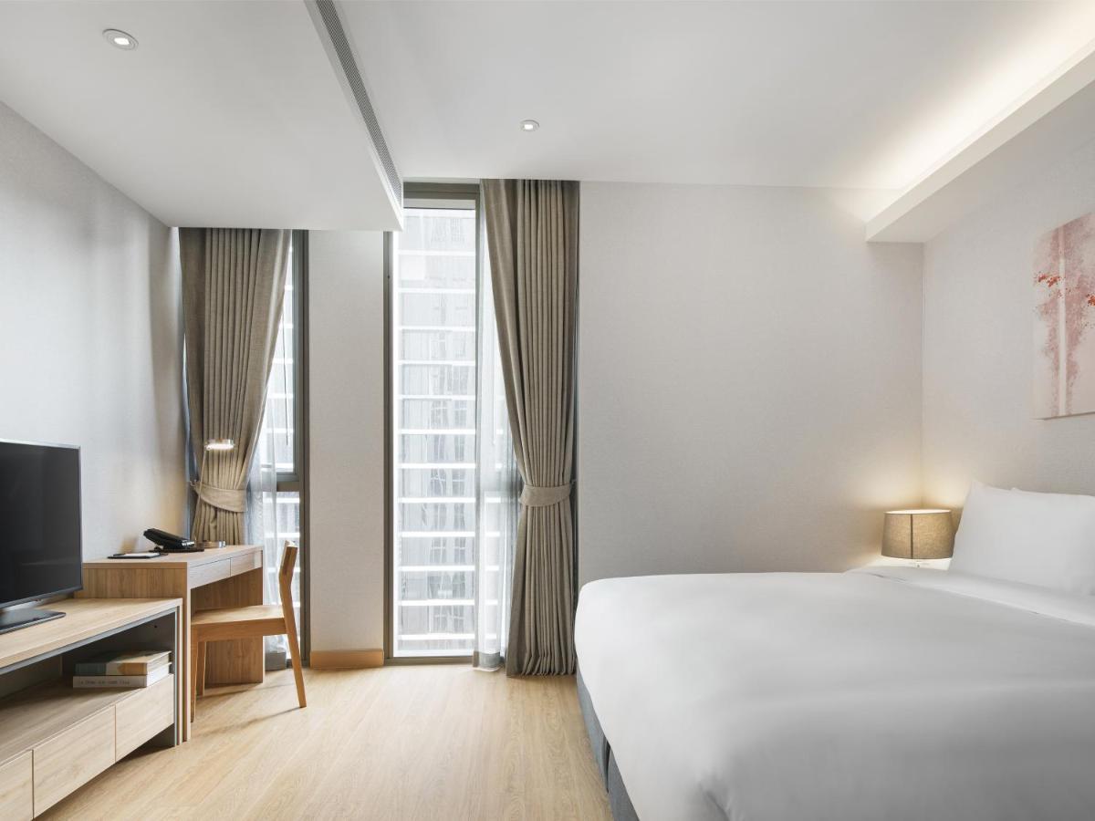 Oakwood Suites Μπανγκόκ Εξωτερικό φωτογραφία Deluxe Room