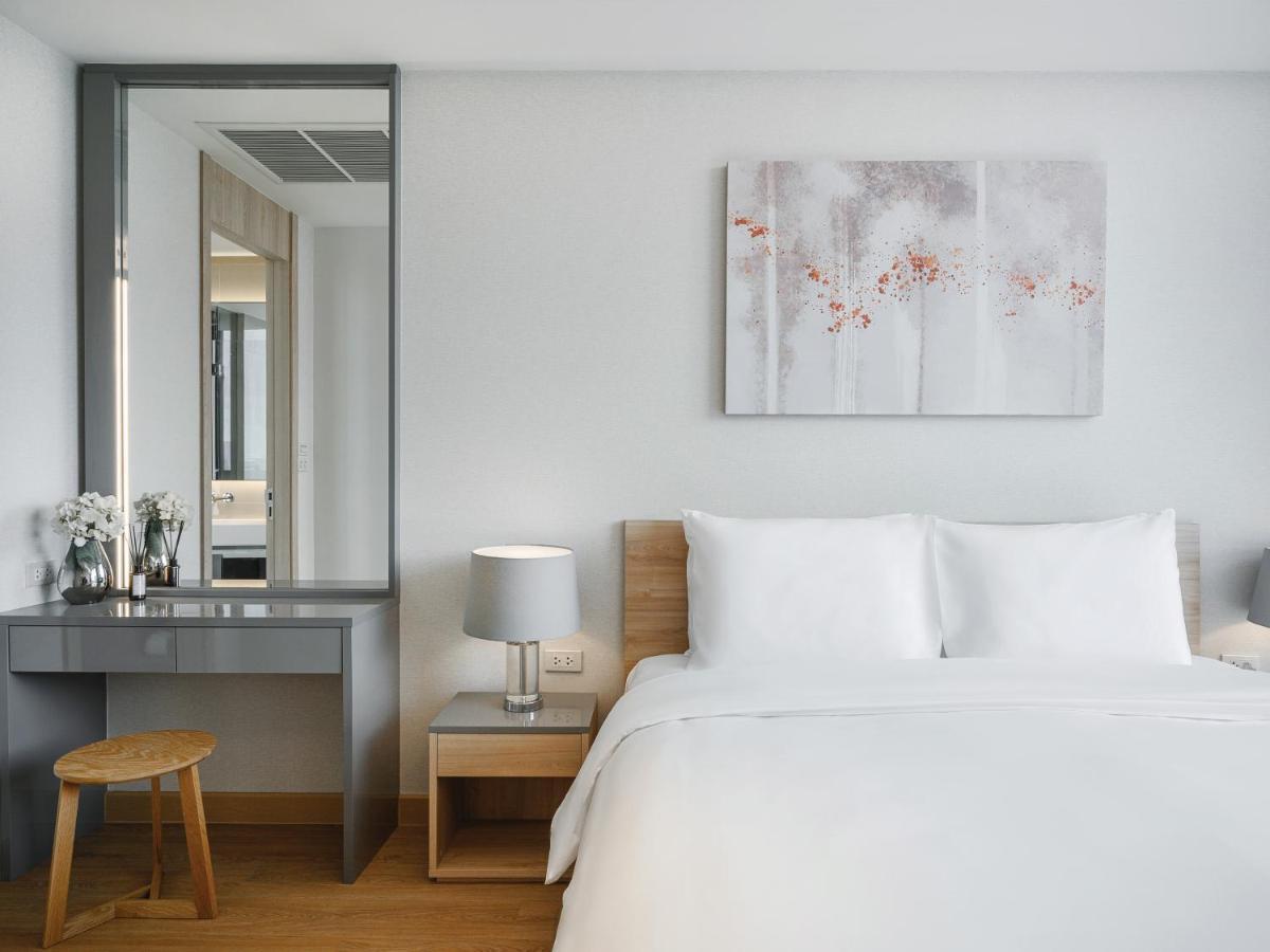 Oakwood Suites Μπανγκόκ Εξωτερικό φωτογραφία A bedroom at the hotel