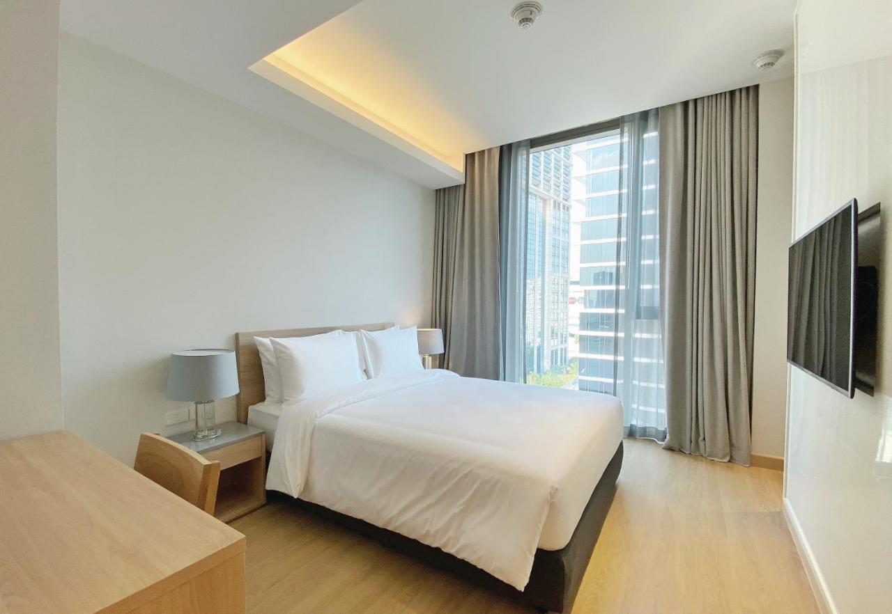 Oakwood Suites Μπανγκόκ Εξωτερικό φωτογραφία A bedroom at the hotel
